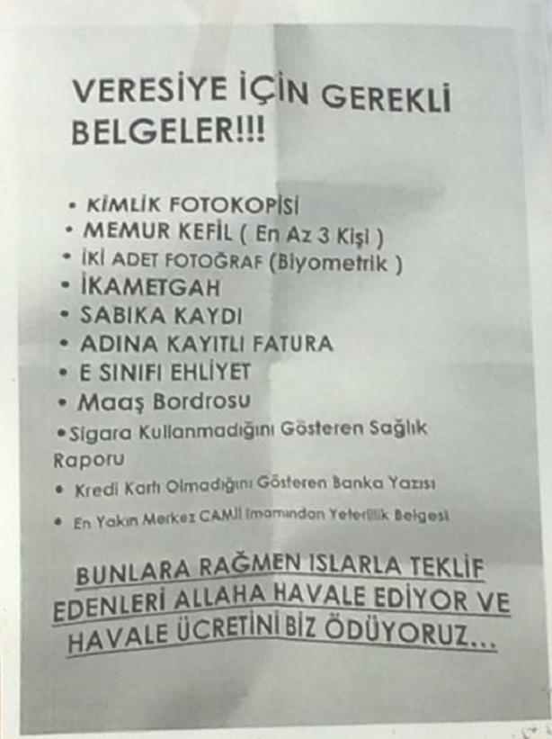 ÇORUM'UN SUNGURLU İLÇESİNDE İŞYERİ SAHİBİ TARAFINDAN ASILAN YAZI GÖRENLERİ GÜLDÜRÜYOR. (SERKAN ŞANSEVER/ÇORUM-İHA)