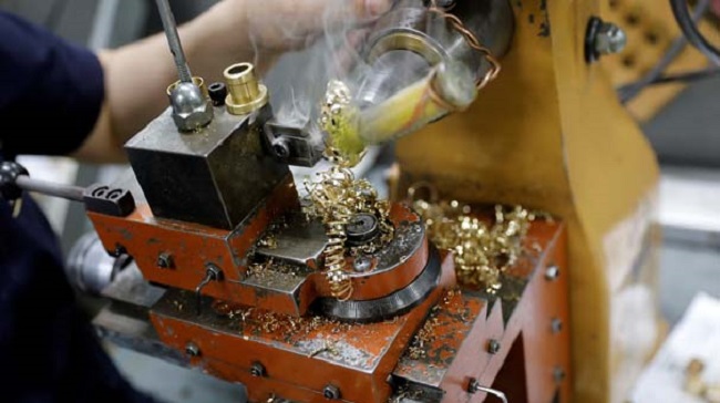 A goldsmith produces wedding rings in Ahlatci Metal Refinery in the central Anatolian city of Corum, Turkey, May 11, 2017. Picture taken May 11, 2017. REUTERS/Umit Bektas