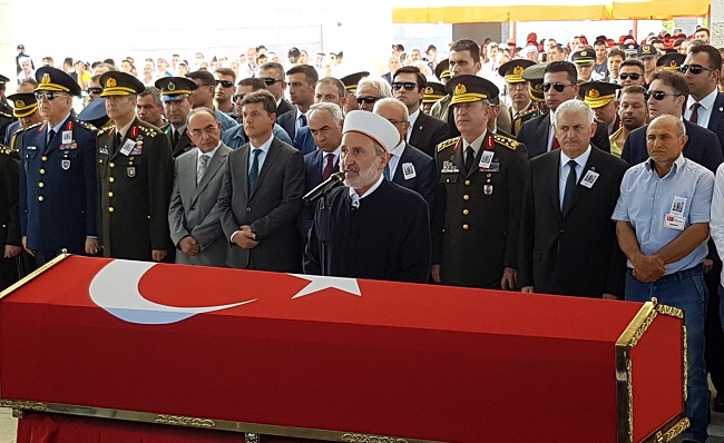 ŞIRNAK’IN ULUDERE İLÇESİ KIRSALINDA ARAÇLA İNTİKAL HALİNDEKİ GÜVENLİK GÜÇLERİNE TERÖRİSTLERCE DÜZENLENEN SALDIRIDA ŞEHİT OLAN JANDARMA ER MUHAMMED FURKAN DEMİREL, ANKARA'DA BAŞBAKAN BİNALİ YILDIRIM'IN DA KATILDIĞI TÖRENLE SON YOLCULUĞUNA UĞURLANIYOR. (YAĞMUR YILDIZ/ANKARA-İHA)
