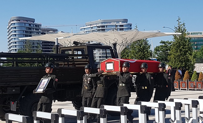 ŞIRNAK’IN ULUDERE İLÇESİ KIRSALINDA ARAÇLA İNTİKAL HALİNDEKİ GÜVENLİK GÜÇLERİNE TERÖRİSTLERCE DÜZENLENEN SALDIRIDA ŞEHİT OLAN JANDARMA ER MUHAMMED FURKAN DEMİREL, ANKARA'DA BAŞBAKAN BİNALİ YILDIRIM'IN DA KATILDIĞI TÖRENLE SON YOLCULUĞUNA UĞURLANIYOR. (EMRE YÜZÜGÜLDÜ - MUSTAFA APAYDIN - YAĞMUR YILDIZ/ANKARA-İHA)