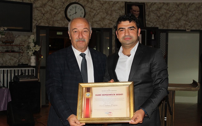 DOĞAN’A FAHRİ HEMŞEHRİLİK BERATI