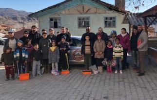 KÖY ÇOCUKLARINA MONT VE BOT YARDIMI