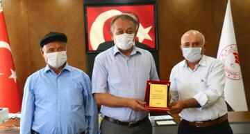 MUHTARDAN ÖZVERİLİ ÇALIŞMA PLAKETİ