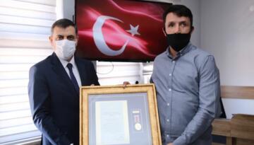 DEVLET ÖVÜÇ MADALYASI ALDILAR